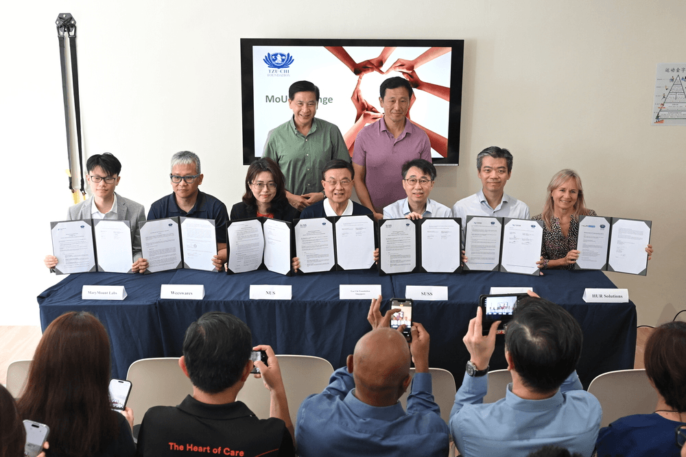 Marymount Labs and partner organisations signing agreements at GLOW Nanyang